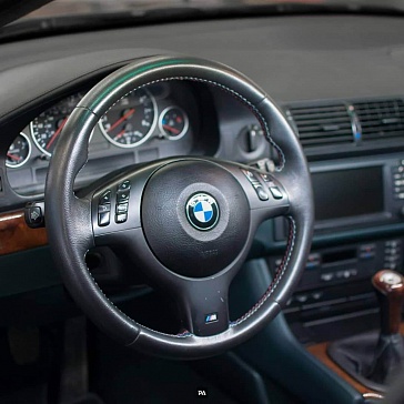 Перетяжка салона BMW M5